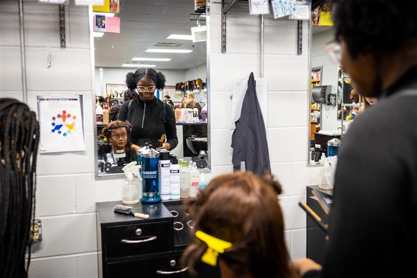 Centennial High students in the cosmetology class